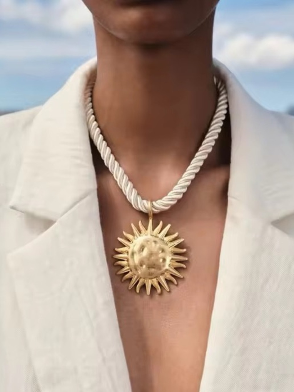 Gold Sun Pendant Necklace with Cream Rope Chain